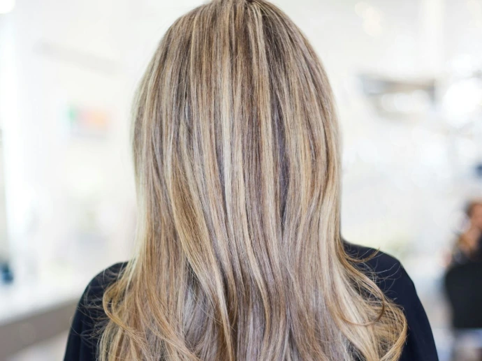 person wearing black top Organic Beauty Salon